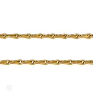 Antique gold long muff chain, France