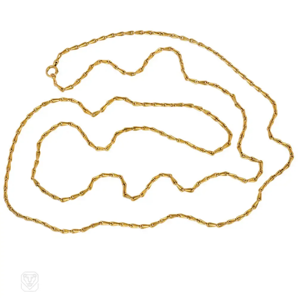 Antique gold long muff chain, France