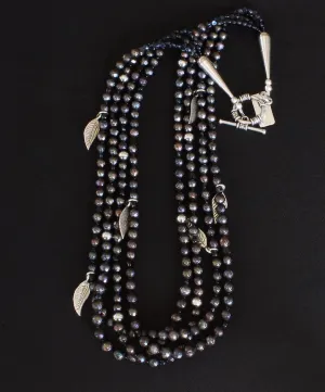 Black Faceted Pearl 4-Strand Necklace with Vintage Czechoslovakian Nailheads, Sterling Silver Leaf Charms, and Oxidized Sterling Silver Rounds