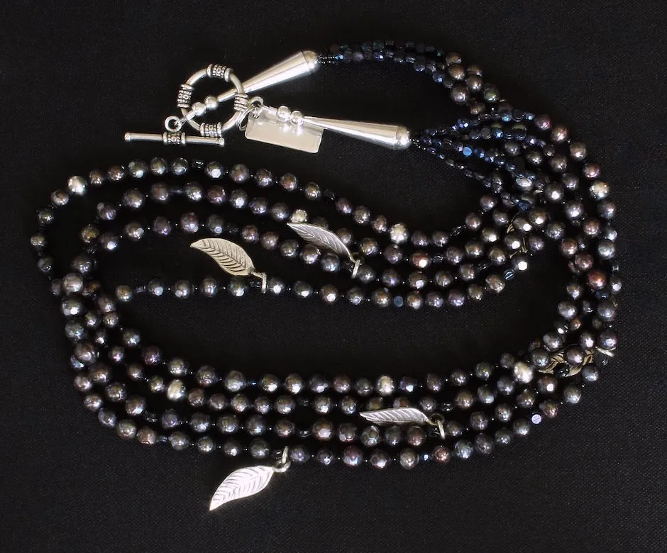 Black Faceted Pearl 4-Strand Necklace with Vintage Czechoslovakian Nailheads, Sterling Silver Leaf Charms, and Oxidized Sterling Silver Rounds